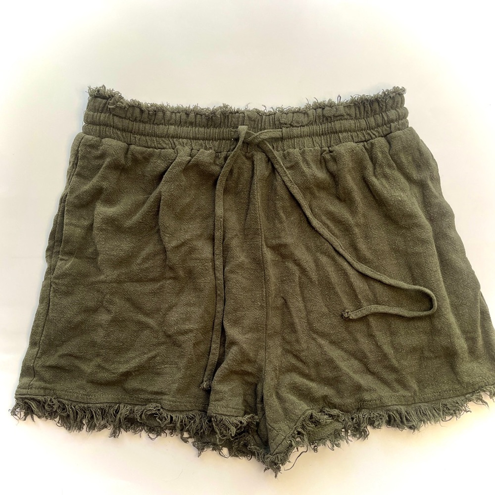 green distressed shorts